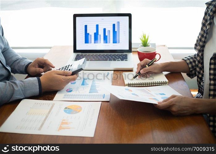 executives negotiating on business agreement with valuation of stock market.