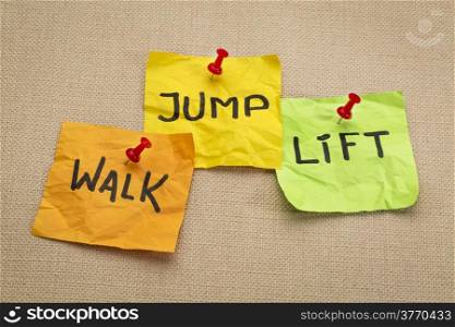 exercise and fitness concept - walk, jump, and lift words on reminder sticky notes
