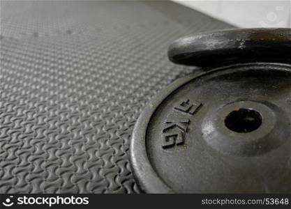 exercise weights - iron dumbbell with extra plates.