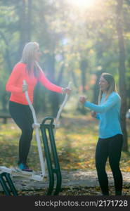 Exercising in Fall in Outdoor Gym. . Exercising in Outdoor Gym.