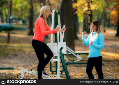 Exercising in Fall in Outdoor Gym. . Exercising in Outdoor Gym.