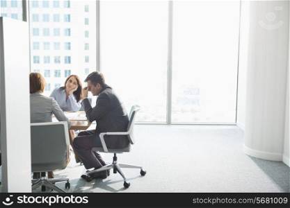 Exhausted businesspeople in meeting