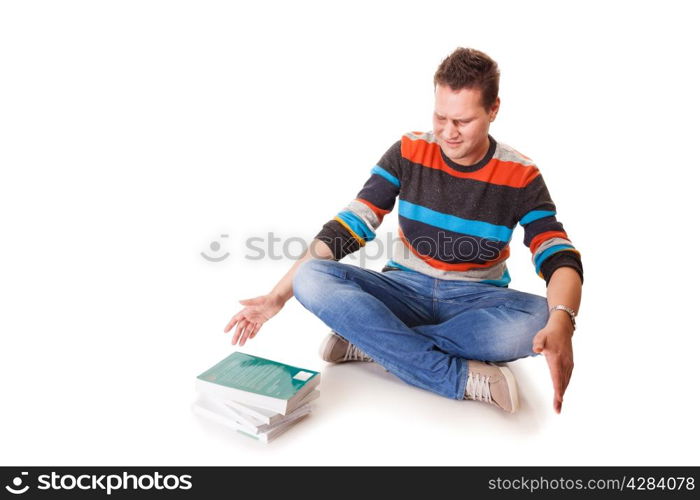 Exhausted , discouraged tired college student with pile of books studying for exams isolated on white background