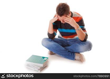 Exhausted , discouraged tired college student with pile of books studying for exams isolated on white background