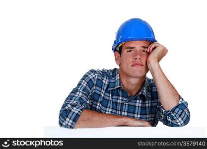 exhausted manual worker