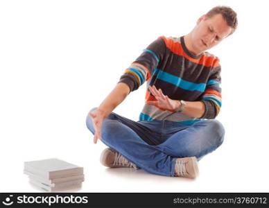 Exhausted tired college student with pile of books studying for exams isolated on white background