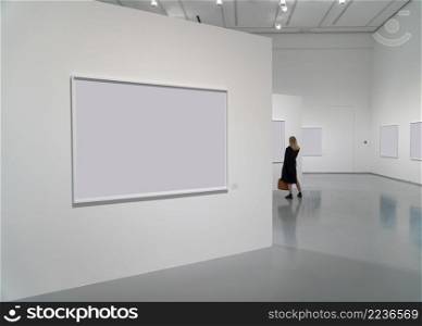 exhibition room of the gallery with blank pictures and people. complex of exhibition galleries