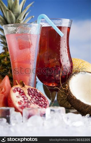 Exotic alcohol drinks. Cocktails in front of beach and sea