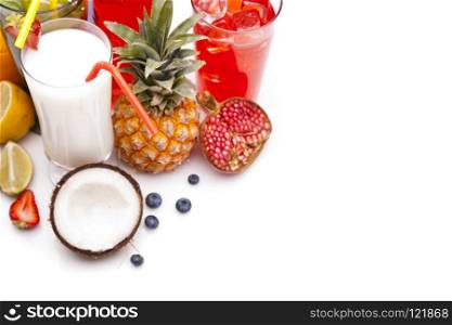 Exotic alcohol drinks set with fruits isolated on white backgrou. Exotic alcohol drinks set with fruits isolated on white background