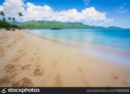 Exotic long exposure seascape during the day, on a public beach in Rincon Beach,Samana peninsula, Dominican Republic