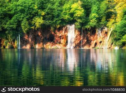 Exotic waterfall and lake landscape of Plitvice Lakes National Park, UNESCO natural world heritage and famous travel destination of Croatia. The lakes are located in central Croatia (Croatia proper).