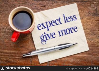 expect less, give more advice - motivation or self improvement concept - handwriting on a napkin with a cup of coffee