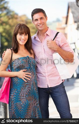 Expectant couple out shopping