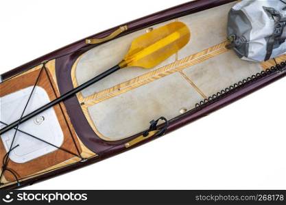expedition or touring stand up paddleboard - top view of a deck with a hatch, paddle, safety leash and a waterproof duffel