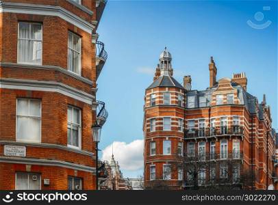 Expensive Edwardian block of period red brick apartments typically found in Kensington, West London, UK