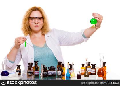 Experiment, research in progress. Chemist woman or student girl, laboratory assistant or scientific researcher with chemical glassware test flask. Isolated on white