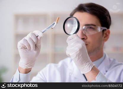 Expert criminologist working in the lab for evidence