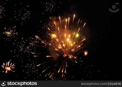 Exploding fireworks on night sky. Abstract background.