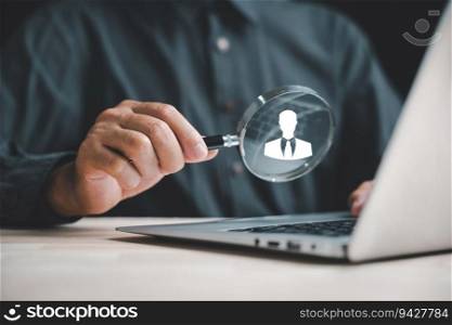 Exploring HRM Magnifier glass zooms in on manager icon among staff icons, symbolizing importance of human resource management in recruitment, leadership, and customer targeting. employees selection