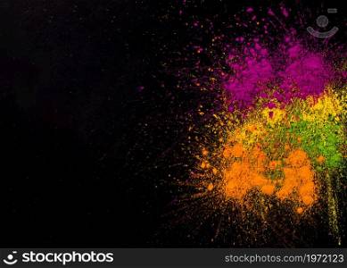 explosion holi colors dark background. High resolution photo. explosion holi colors dark background. High quality photo