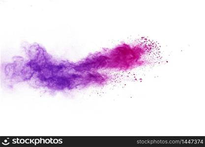 Explosion of purple powder isolated on white background.