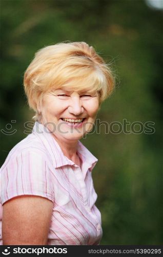Expression &amp; Positive Emotions. Amiable Old Woman with Beaming Toothy Smile
