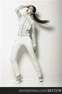 Expression. Futuristic Woman in White Trousers. Trend. Series of Photos of Urban Fashion
