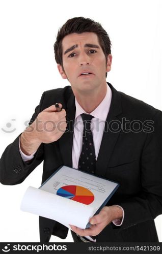 Expressive businessman with graph