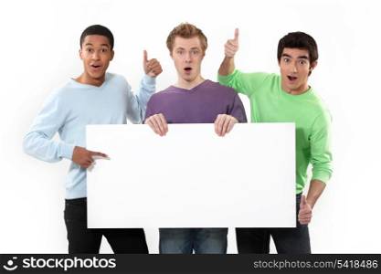 Expressive men holding a white sign for message