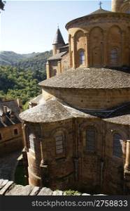 Exterior chapels and turrets from the 13th century, Abbey Church of St. Foy, Conques, France
