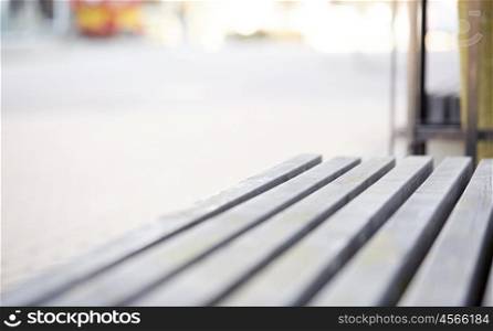 exterior concept - close up of wooden city street bench. close up of wooden city street bench