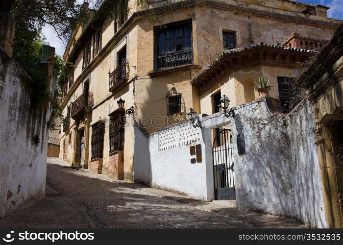 Exterior historic architecture of 18th century House of the Moorish King (Spanish: La Casa del Rey Moro) in Ronda Old Town, Andalucia, Spain.