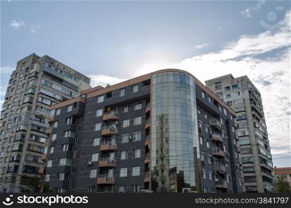 Exterior of glass residential building sunrise view