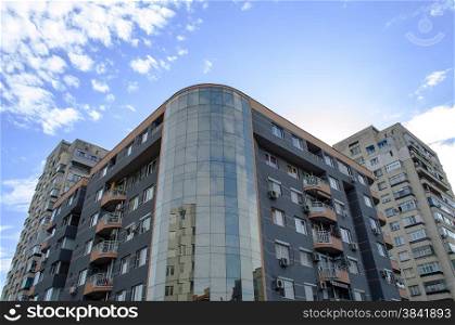 Exterior of glass residential building sunrise view