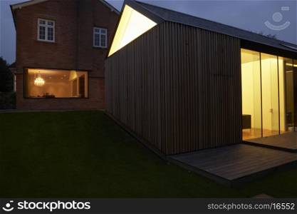 Exterior Of Modern House With Extension At Night