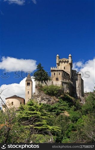 exterior of Saint-Pierre Castle and church in Aosta valley, Italy