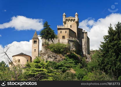 exterior of Saint-Pierre Castle and church in Aosta valley, Italy