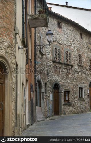 Exterior stone walls of houses in town, Radda in Chianti, Tuscany, Italy