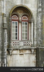 Exterior view of building windows in Lisbon, Portugal.