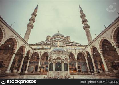 Exterior view of New Mosque,Ottoman imperial mosque located in Istanbul, Turkey.DECEMBER 24,2016.. ISTANBUL/TURKEY- DECEMBER 24,2016: The New Mosque (Yeni Camii). The New Mosque is an Ottoman imperial mosque completed in 1665, located in Istanbul, Turkey