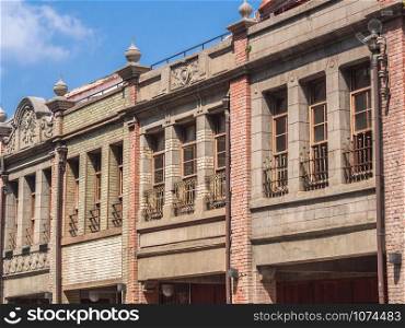 Exterior view of old brick buildings in Bopiliao Historical Block, a Heritage and Culture Education Center of Taipei City.