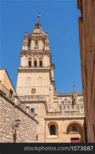 Exterior view of the bell tower and carvings on the roof of the old Cathedral in Salamanca. Ornate bell tower on the old Cathedral in Salamanca