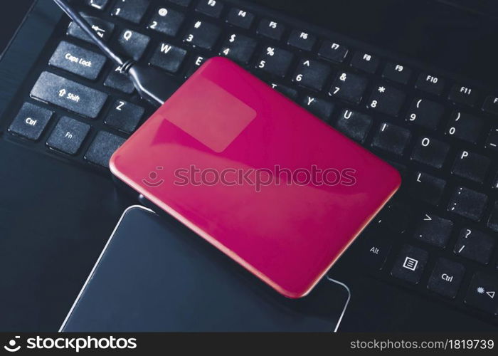 External hard disk 2.5 inch on the laptop keyboard
