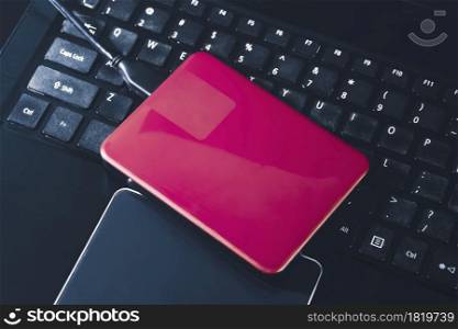 External hard disk 2.5 inch on the laptop keyboard