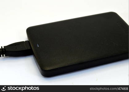 External hard disk of a black tetra of color.