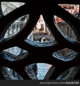 External View from an Opening inside Bridge of Sighs in Venice - Italy