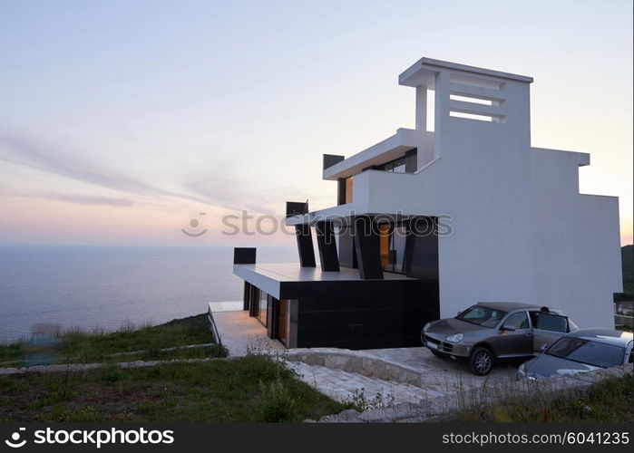 External view of a contemporary house modern villa at sunset