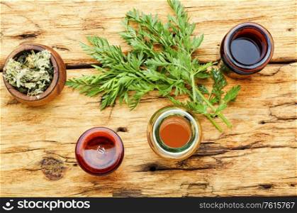 Extract or tincture from a wild carrots.Medicinal herbs. Wild carrots in herbal medicine