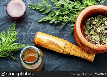 Extract or tincture from a wild carrots.Medicinal herbs. Wild carrots in herbal medicine