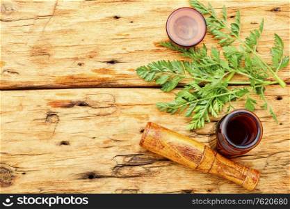 Extract or tincture from a wild carrots.Medicinal herbs. Wild carrots in herbal medicine